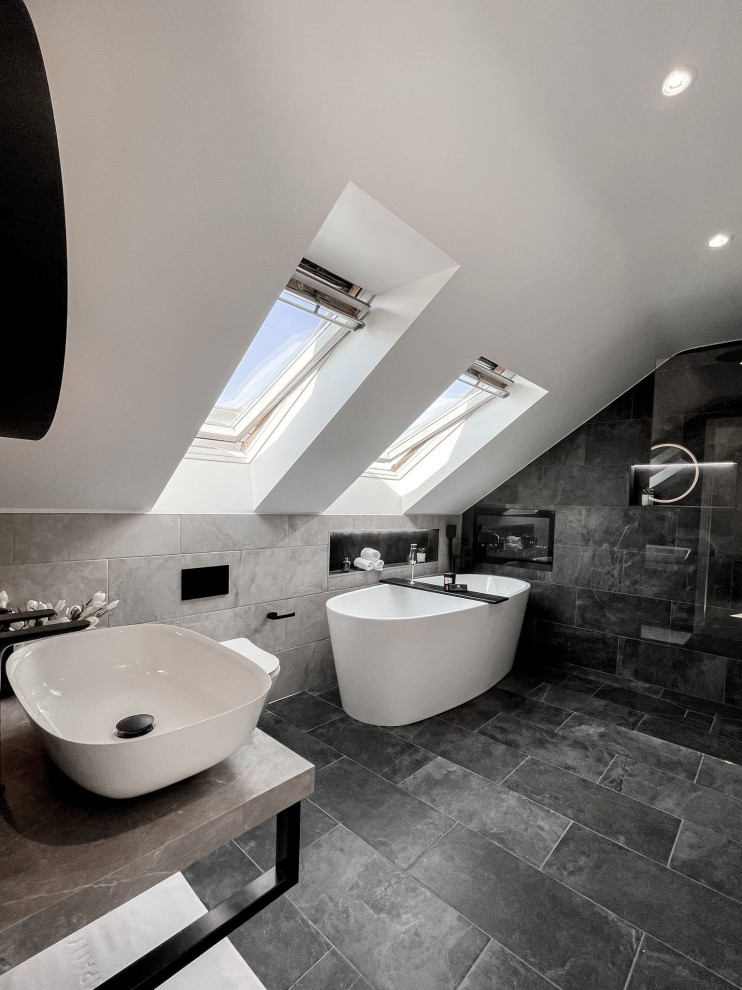Luxurious Loft Bathroom with Freestanding Tub and Skylight Design