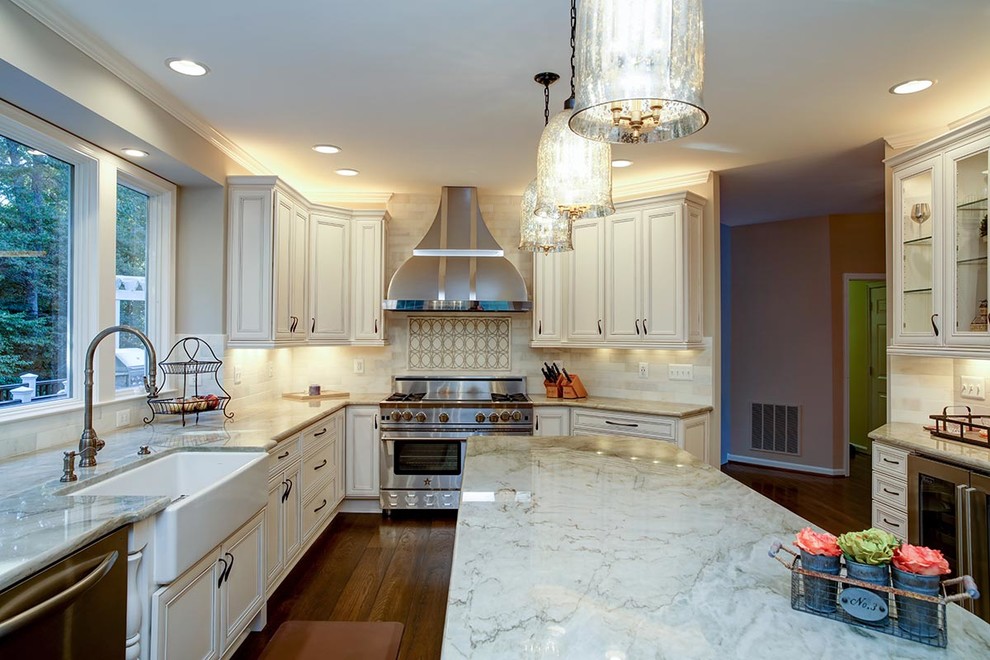 Inspiration for a transitional u-shaped dark wood floor eat-in kitchen remodel in Cedar Rapids with a farmhouse sink, flat-panel cabinets, white cabinets, marble countertops, stainless steel appliances and an island