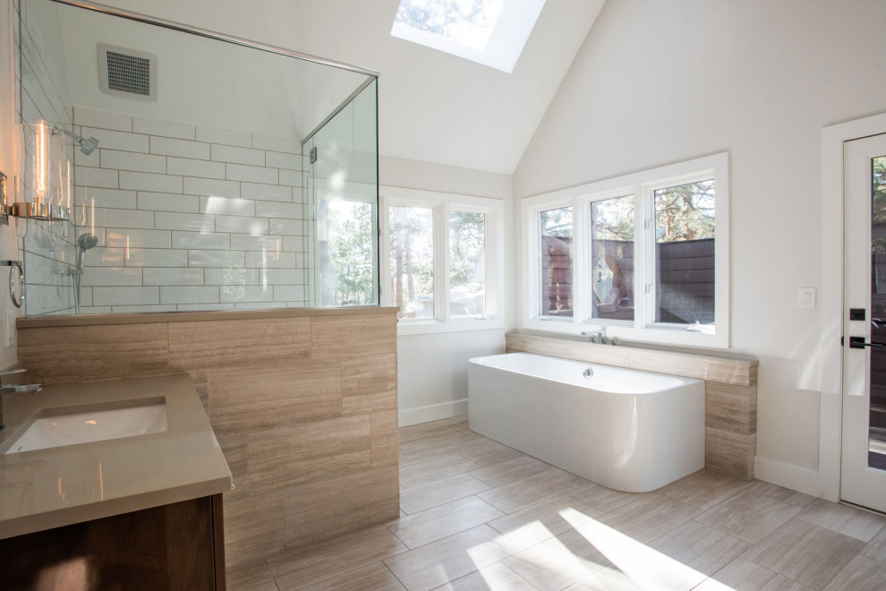 Example of a mid-sized trendy master white tile and mosaic tile medium tone wood floor and single-sink bathroom design in Other with shaker cabinets, dark wood cabinets, white walls and an undermount sink