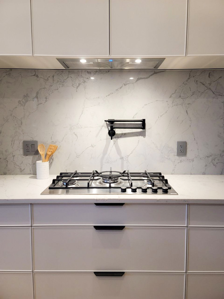 Example of a minimalist kitchen design in Vancouver