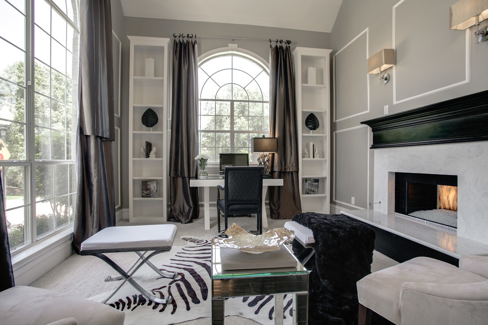 This is an example of a mid-sized transitional study room in Dallas with grey walls, dark hardwood floors, a standard fireplace, a tile fireplace surround and a freestanding desk.