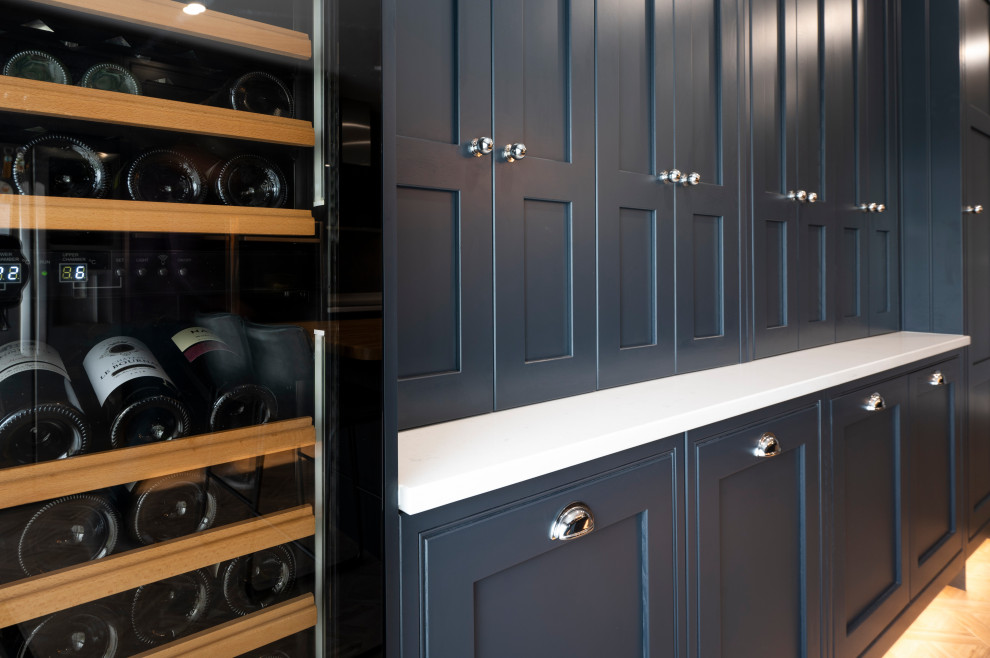 Bifold doors hide away the gin bar Transitional Wine Cellar Kent