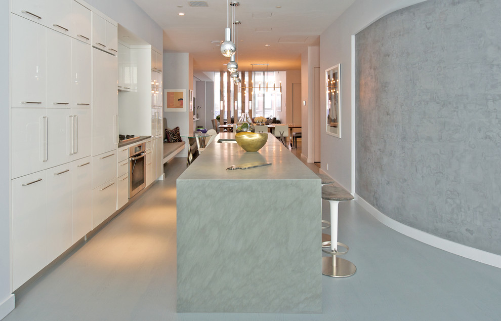 Eat-in kitchen - mid-sized contemporary u-shaped eat-in kitchen idea in New York with an undermount sink, shaker cabinets, white cabinets, stainless steel appliances, an island, mosaic tile backsplash and granite countertops