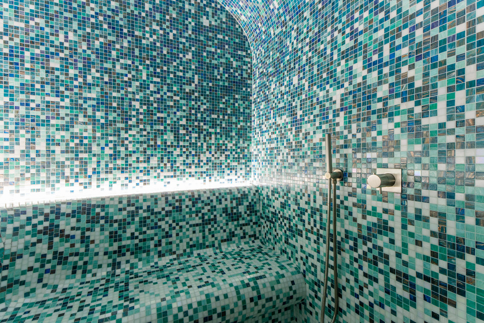 Mid-sized mediterranean 3/4 bathroom in Lyon with an alcove shower, white tile, blue tile, multi-coloured tile, blue walls and mosaic tile.