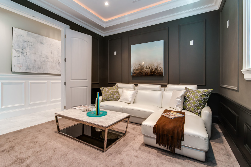 This is an example of a transitional enclosed living room in Vancouver with grey walls.