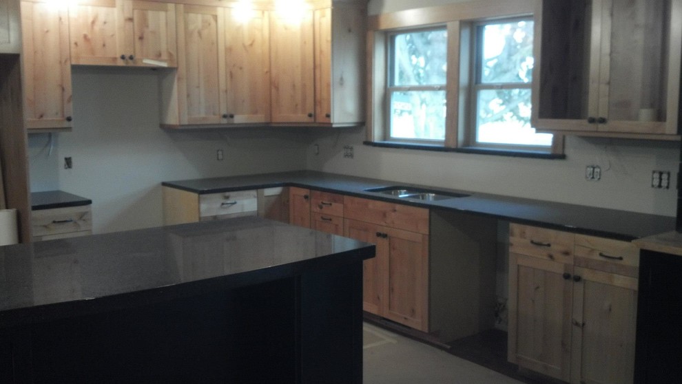 Inspiration for a rustic kitchen remodel in Orange County