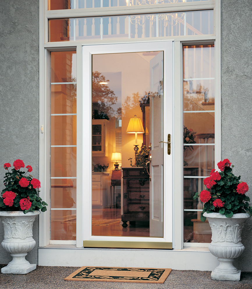 Inspiration for a transitional front door remodel with a white front door