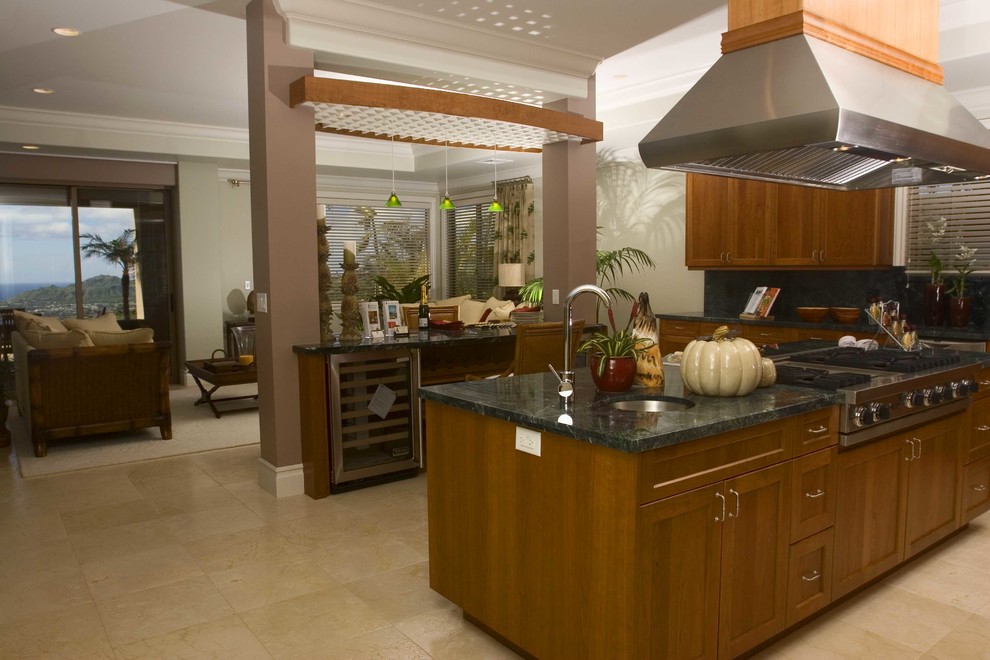 Inspiration for a large tropical l-shaped open plan kitchen in Hawaii with an undermount sink, beige floor, stainless steel appliances, shaker cabinets, dark wood cabinets, granite benchtops, multi-coloured splashback, stone slab splashback, multiple islands and multi-coloured benchtop.