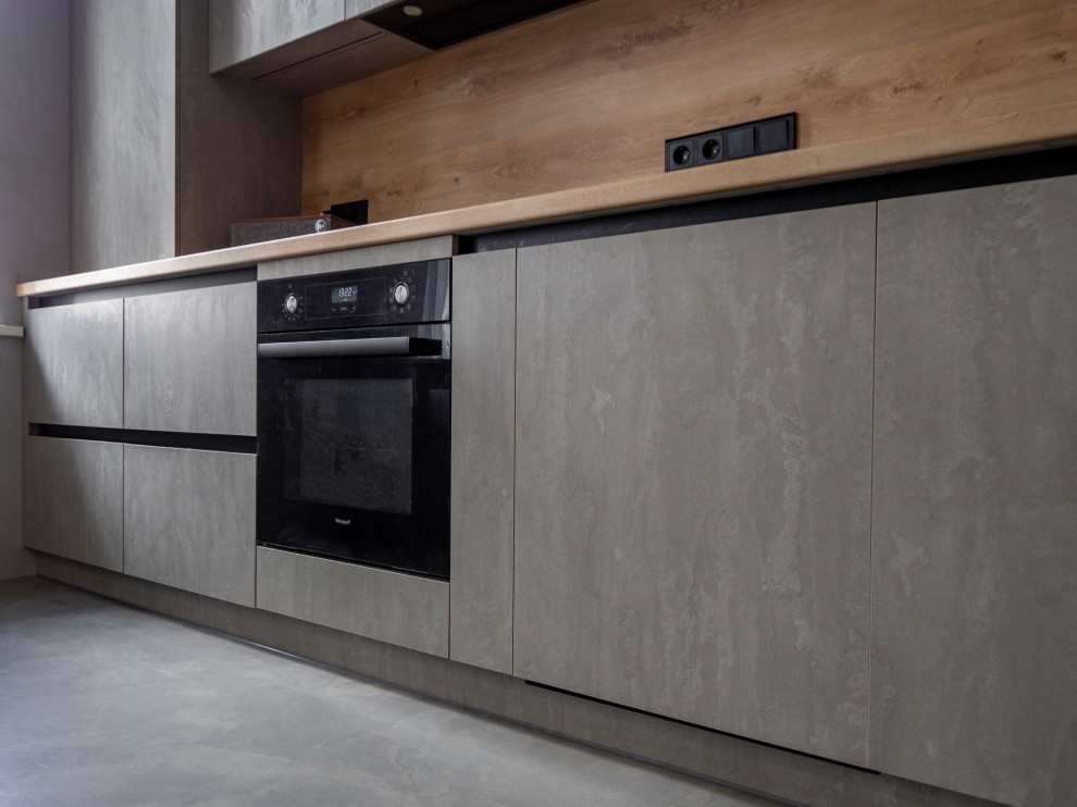 Элегантная минималистичная кухня в сером цвете