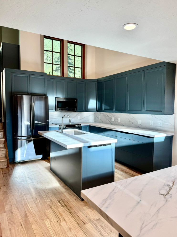 Custom kitchen cabinets, matching countertops, island, back splash, new custom t