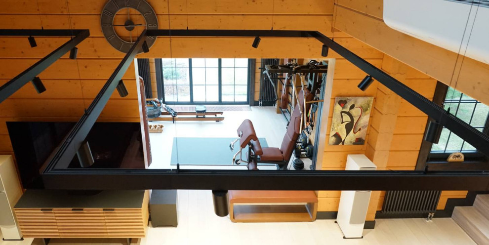 Получился зал в единой цветовой гамме, прекрасно дополняющий lounge-зону дома