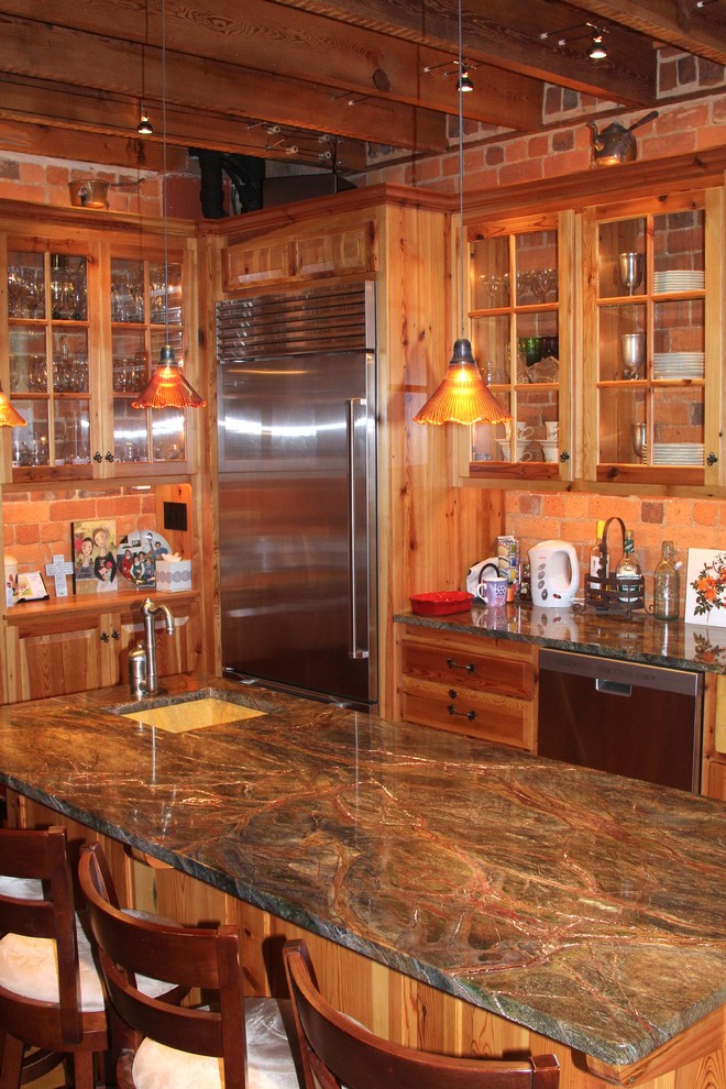 Inspiration for a kitchen in Richmond with raised-panel cabinets, granite benchtops and stainless steel appliances.