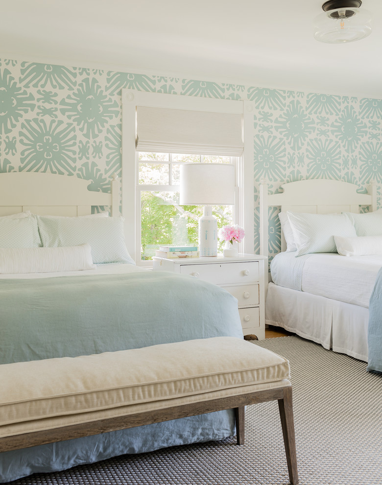 Beach style guest medium tone wood floor and beige floor bedroom photo in Boston with multicolored walls