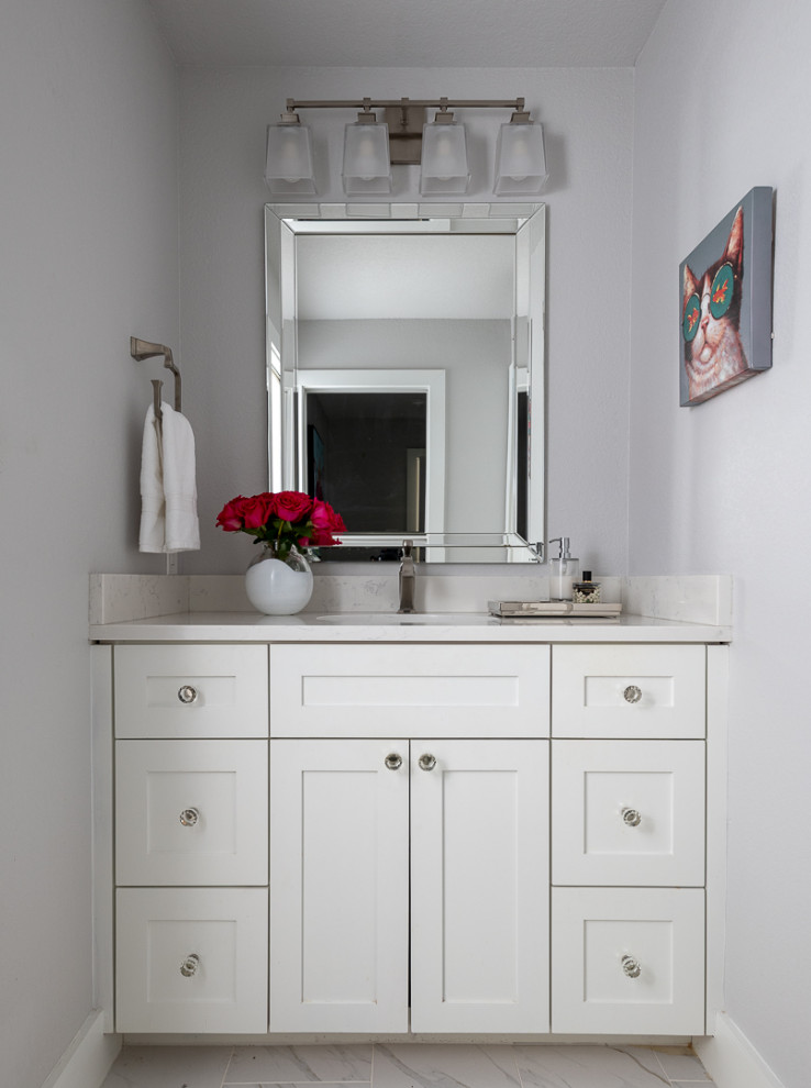 Photo of an eclectic kids bathroom in Dallas with white cabinets, grey walls, white benchtops and a single vanity.