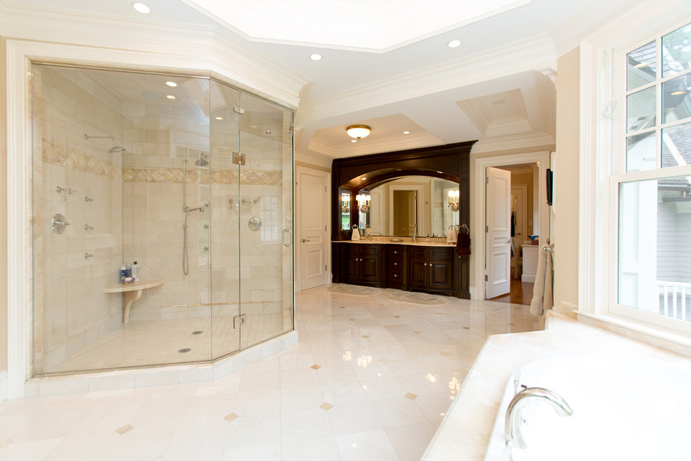 Traditional master bathroom in Boston with recessed-panel cabinets, dark wood cabinets, an alcove tub, a double shower, beige walls, ceramic floors and a drop-in sink.