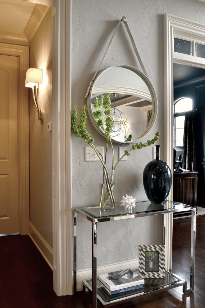 Foyer - mid-sized transitional dark wood floor foyer idea in Indianapolis with gray walls and a dark wood front door