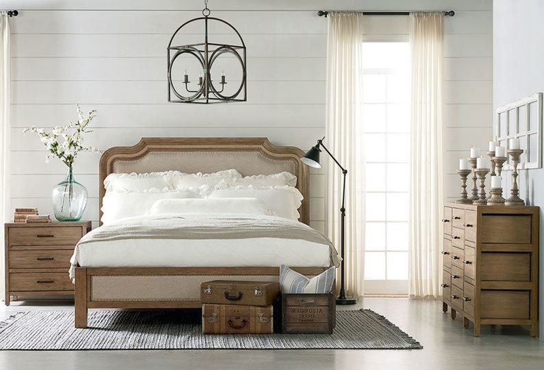 Example of a farmhouse bedroom design in Chicago