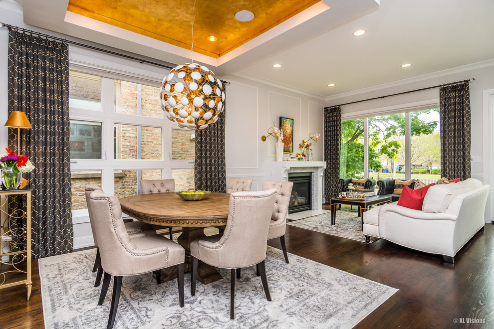 Great room - mid-sized transitional dark wood floor and brown floor great room idea in Boston with gray walls, a standard fireplace and a stone fireplace
