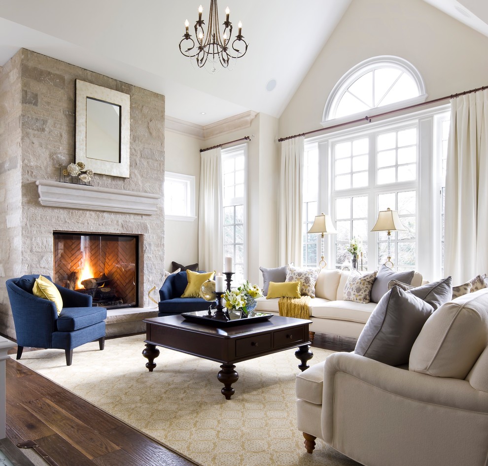 This is an example of a traditional living room in Toronto with white walls.