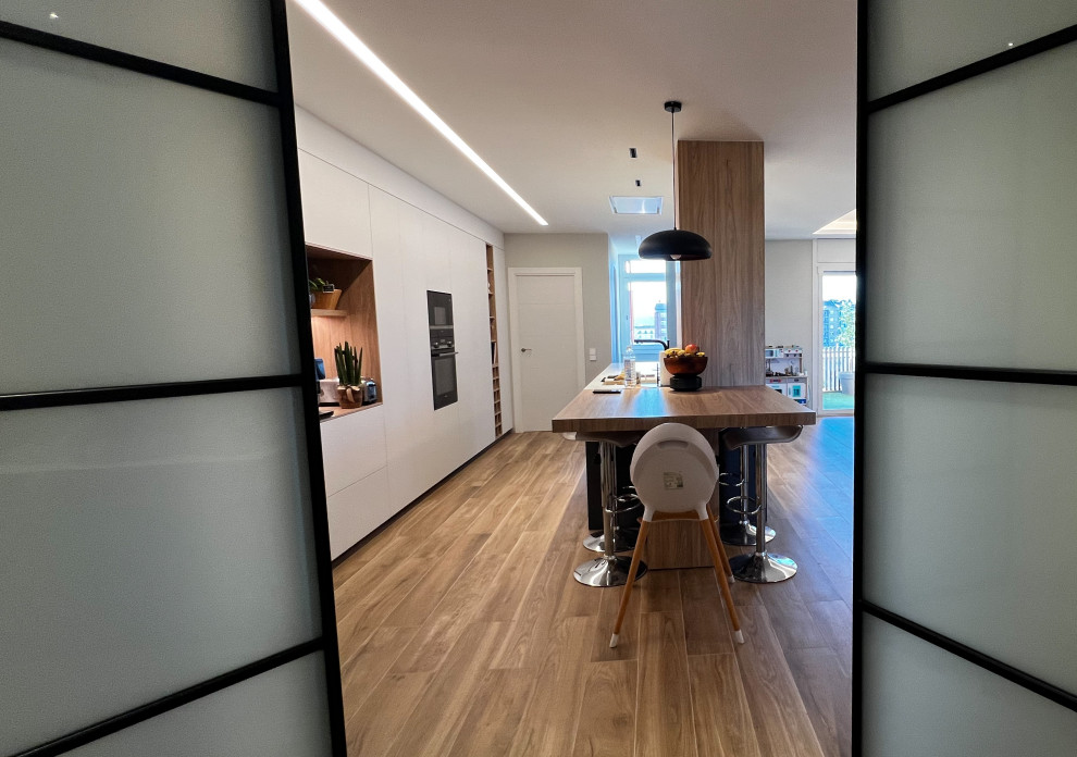 Cocina integrada a Salón en Igualada