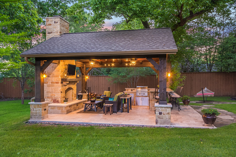 Inspiration for a mid-sized country backyard patio in Houston with an outdoor kitchen, tile and a gazebo/cabana.