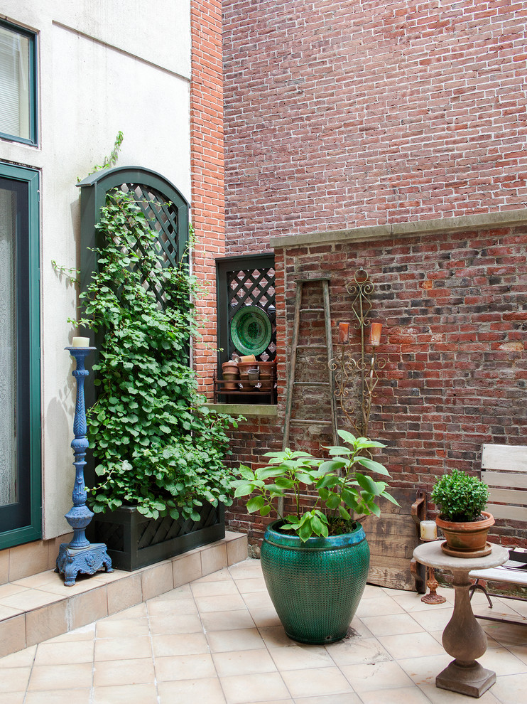 Design ideas for an eclectic patio in New York.