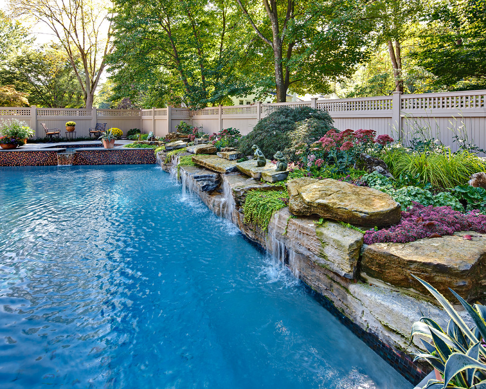 Inspiration for a traditional rectangular natural pool in New York.