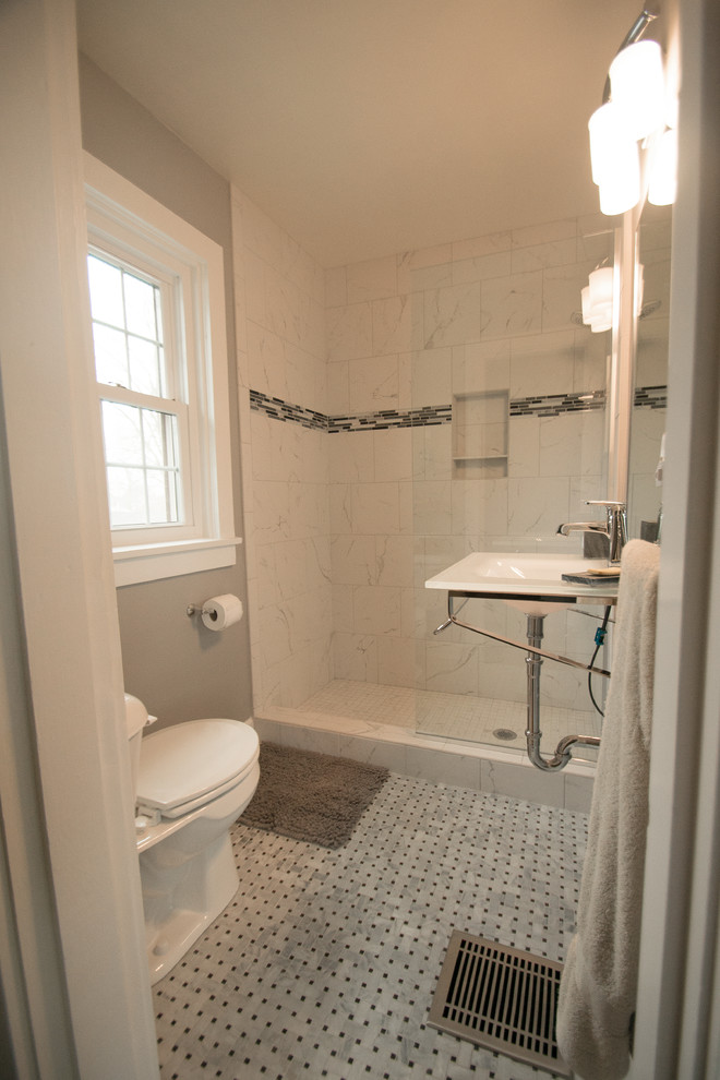 Inspiration for a mid-sized eclectic 3/4 bathroom in Louisville with an open shower, a two-piece toilet, black and white tile, glass tile, grey walls, ceramic floors, a wall-mount sink and glass benchtops.