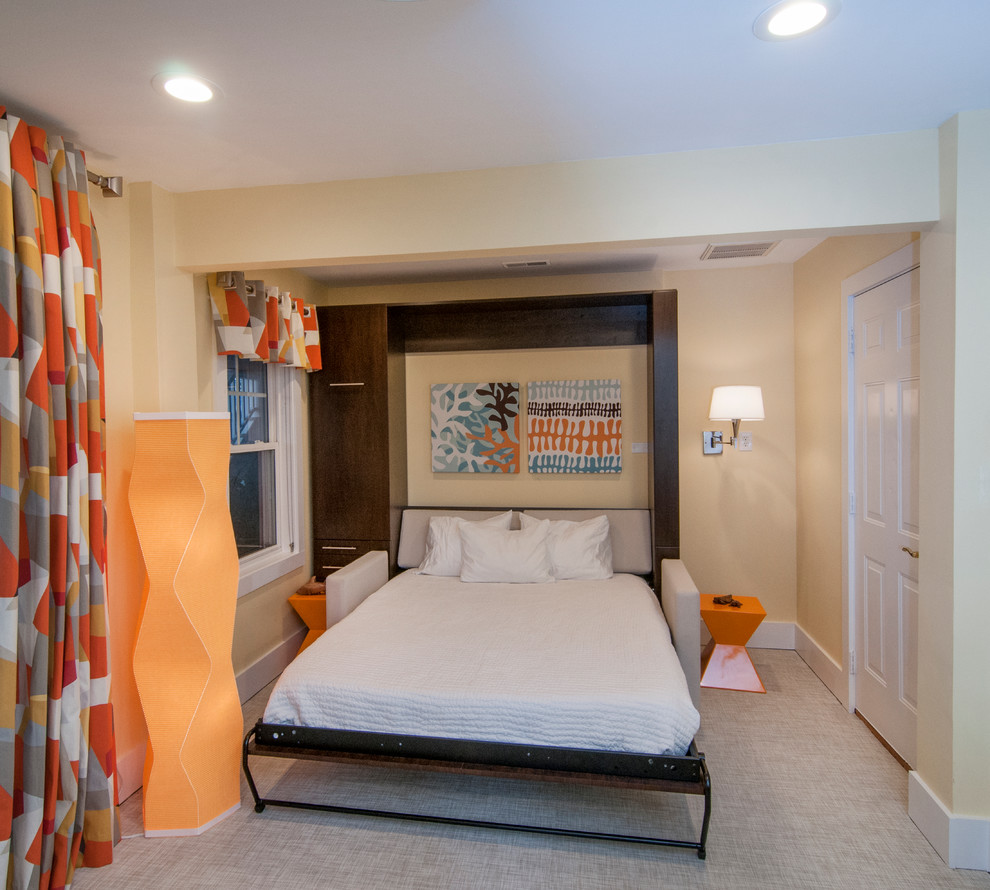 This is an example of a small contemporary guest bedroom in Other with yellow walls.