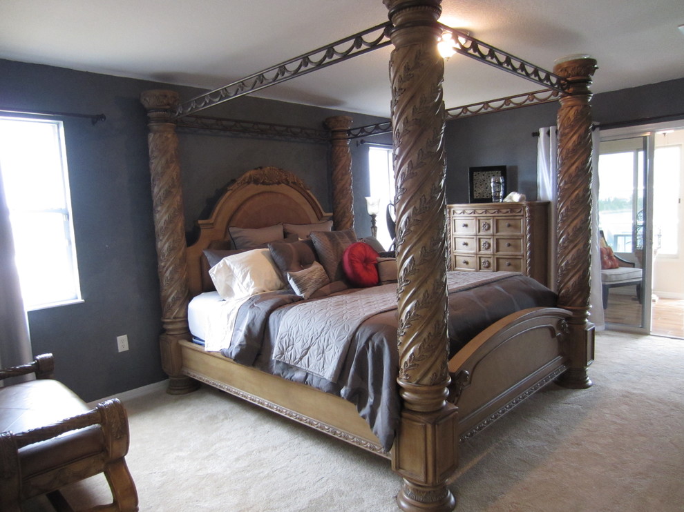 Inspiration for a large traditional master bedroom in Tampa with grey walls, carpet and no fireplace.
