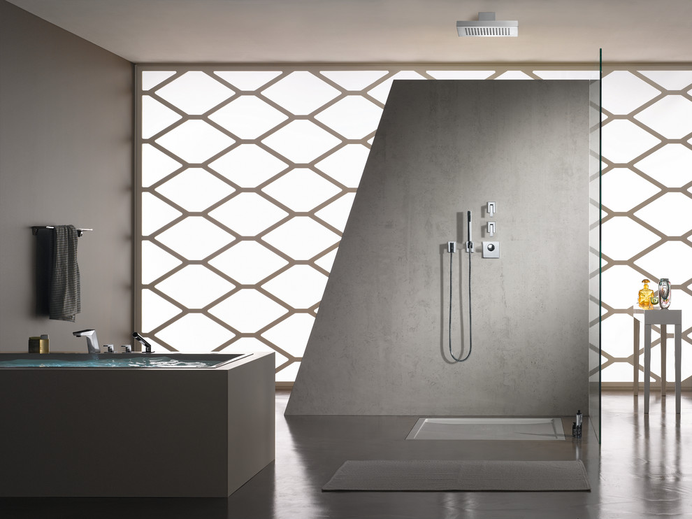 Inspiration for a large modern master bathroom in Miami with a drop-in tub, an open shower, gray tile, grey walls, concrete floors, grey floor and an open shower.