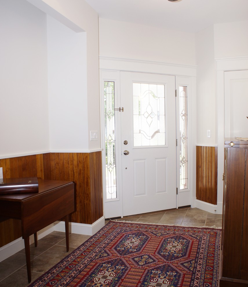 Single front door - mid-sized transitional porcelain tile single front door idea with white walls and a white front door