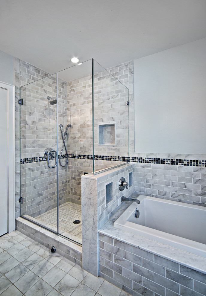Design ideas for a mid-sized contemporary master bathroom in New York with marble benchtops, a drop-in tub, a corner shower, gray tile, grey walls, porcelain floors and ceramic tile.
