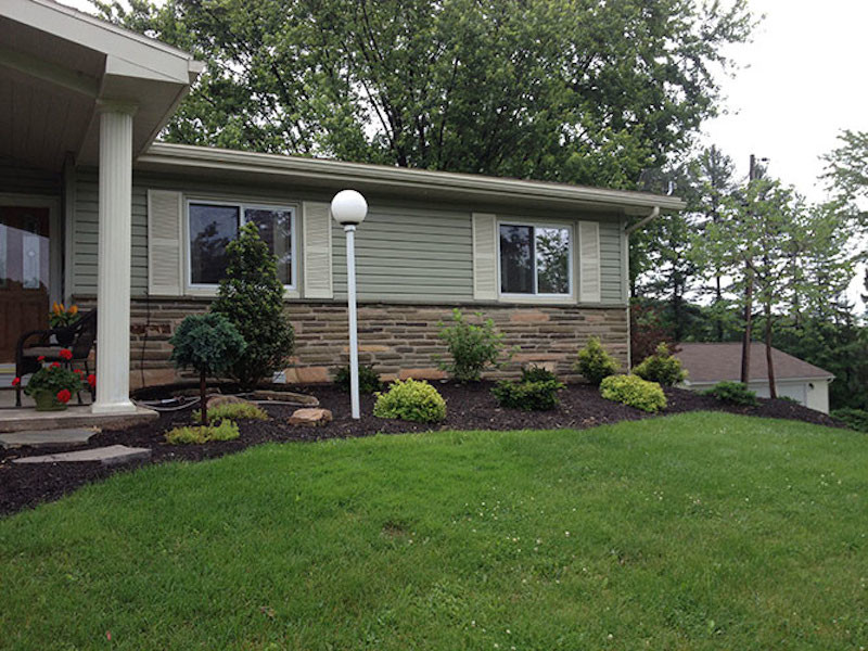 Design ideas for a front yard mulch formal garden.