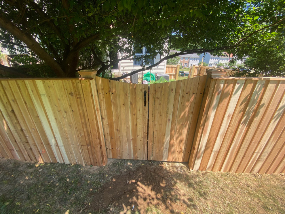 Cedar board and batten fence