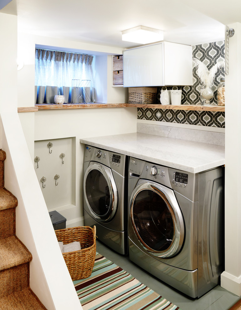 Photo of a contemporary dedicated laundry room in Toronto with a side-by-side washer and dryer.