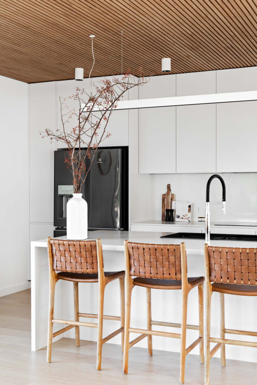 Chic Contrast: White Kitchen Island Concepts with Wood Ceiling and White Cabinets