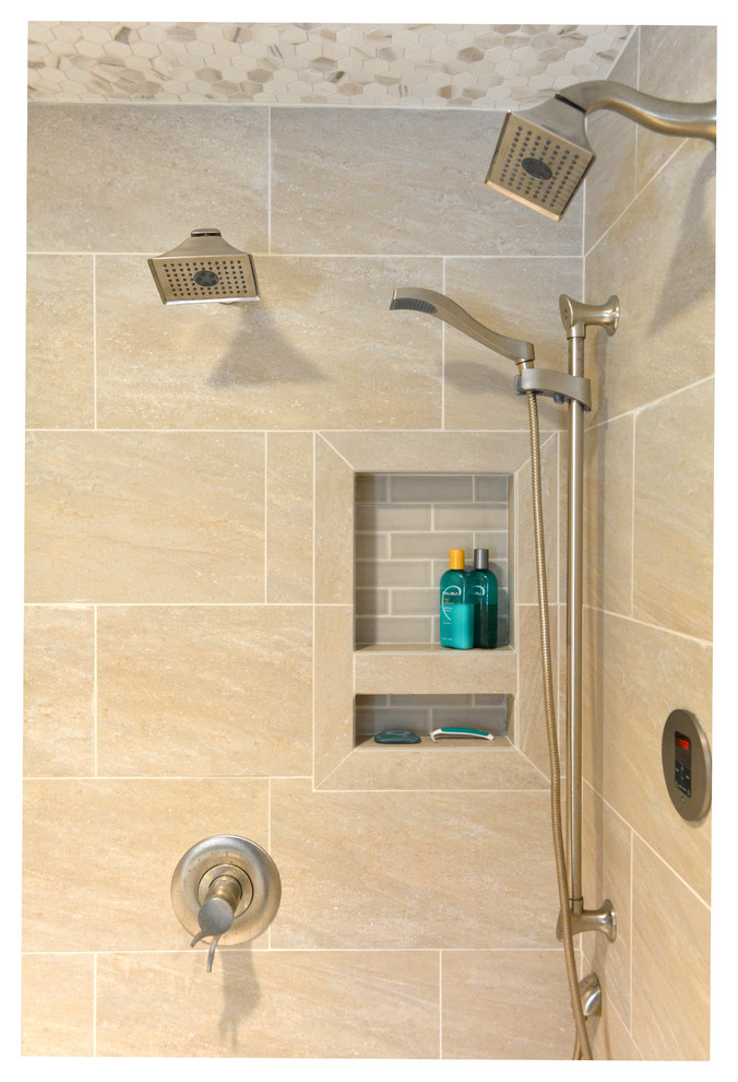 Corner shower - mid-sized transitional master beige tile and porcelain tile corner shower idea in Indianapolis