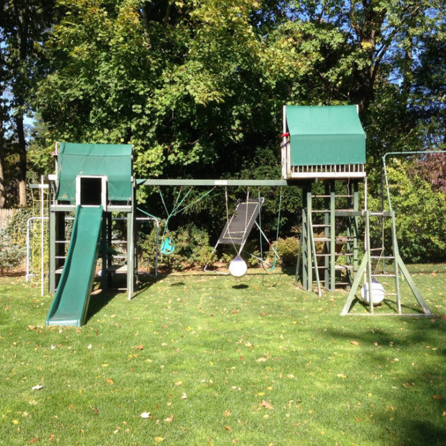 The old Play Set used by our kids the space is then turned into a vegetable garden by Peter Atkins and Associates