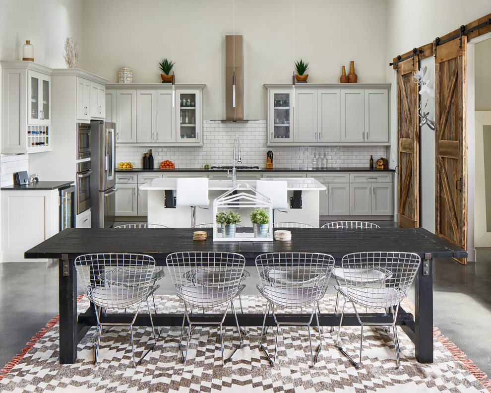 Kitchen/dining room combo - country concrete floor and gray floor kitchen/dining room combo idea with gray walls
