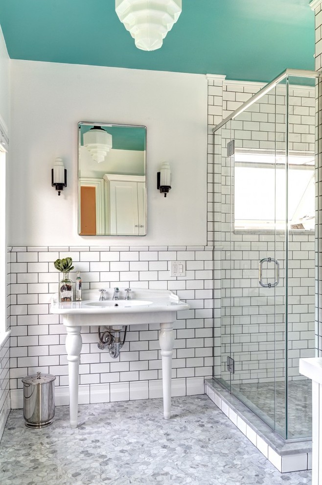 This is an example of a mid-sized traditional master bathroom in Columbus with a console sink, white tile, subway tile, white walls and mosaic tile floors.