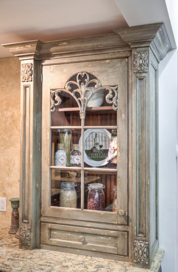 Large mountain style u-shaped porcelain tile eat-in kitchen photo in Toronto with an undermount sink, raised-panel cabinets, brown cabinets, quartz countertops, beige backsplash, stainless steel appliances and an island