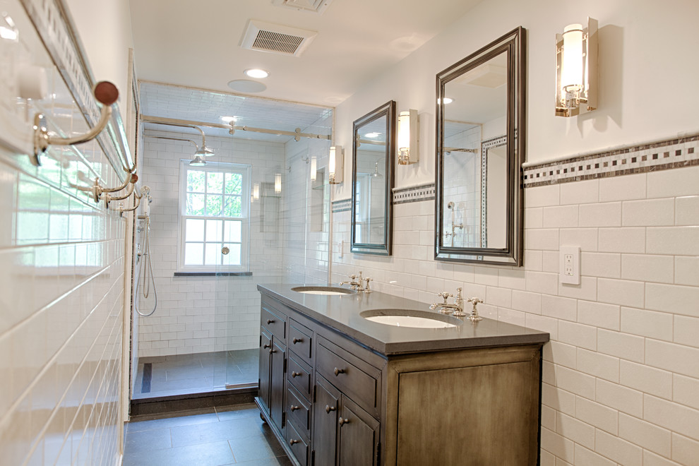 Inspiration for a large contemporary master bathroom in Philadelphia with an undermount sink, flat-panel cabinets, medium wood cabinets, an alcove shower, a bidet, white tile, subway tile, white walls, granite benchtops and porcelain floors.