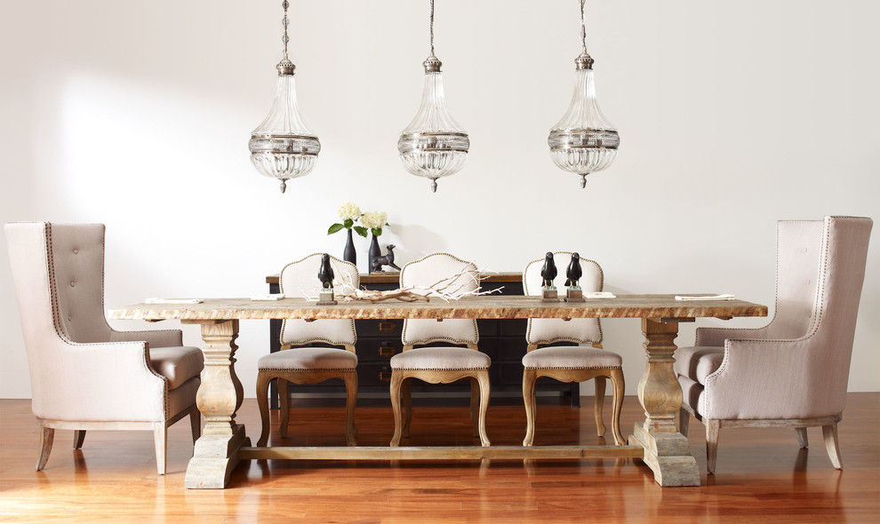 Design ideas for a large eclectic open plan dining in Charlotte with white walls and medium hardwood floors.