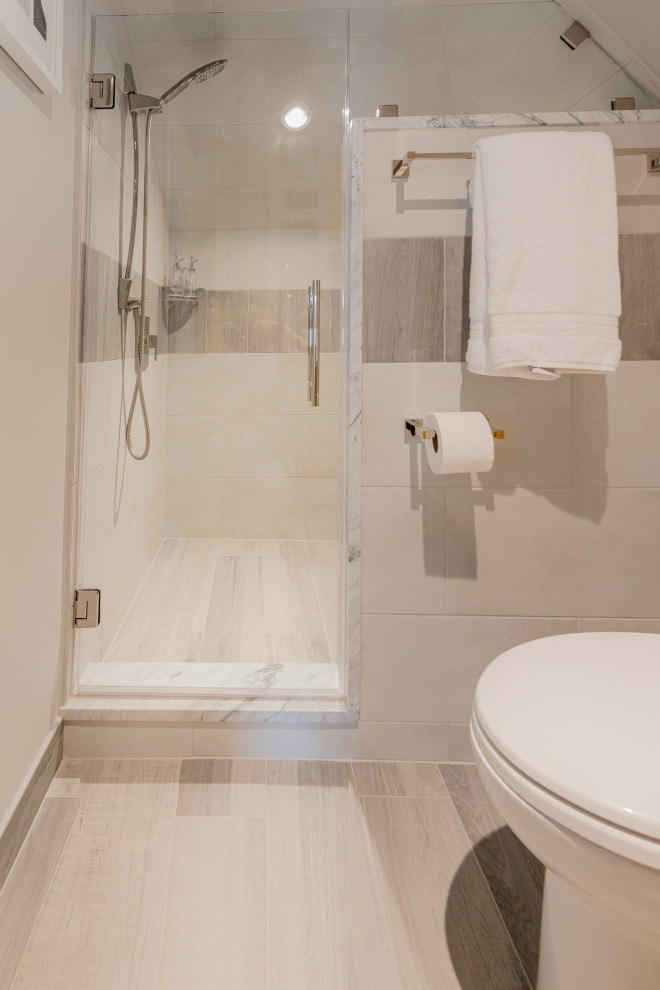 Inspiration for a small modern shower room bathroom in Houston with yellow cabinets, an alcove shower, a two-piece toilet, a single sink and a freestanding vanity unit.