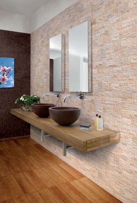 Mid-sized beach style bathroom in Brisbane with a vessel sink, open cabinets, light wood cabinets, wood benchtops, beige tile, porcelain tile, brown walls and medium hardwood floors.