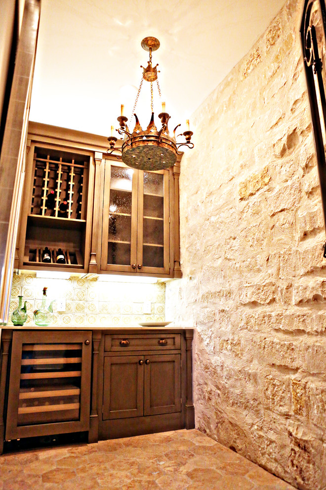 Wine cellar - rustic wine cellar idea in Austin