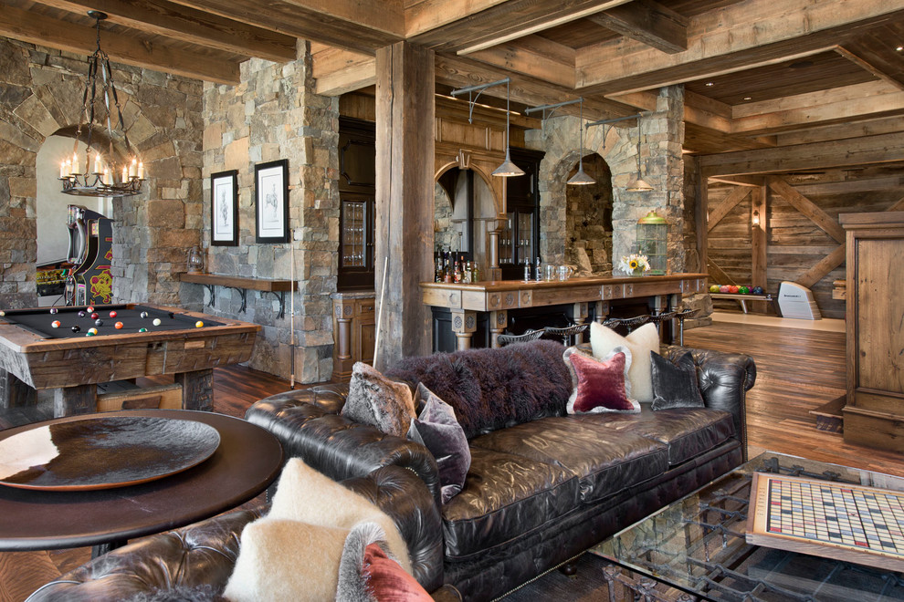 Inspiration for a country open concept family room in Other with dark hardwood floors.
