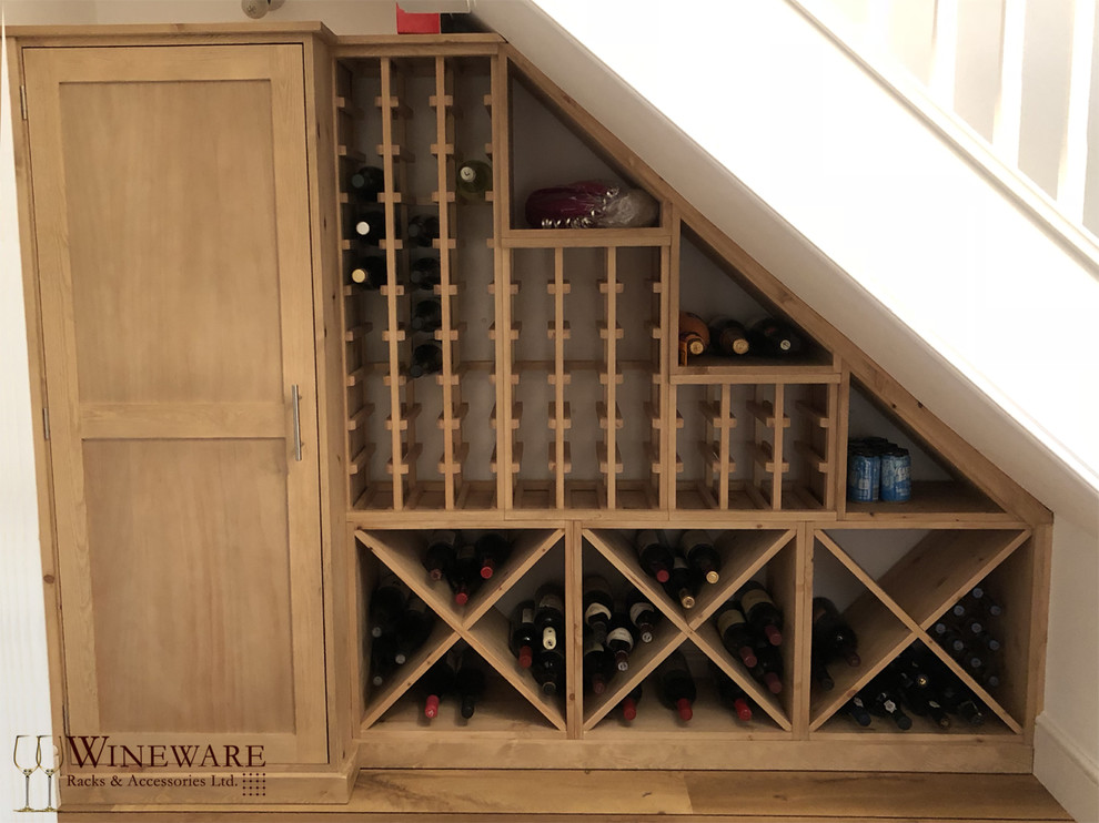 Contemporary wine cellar with storage racks.