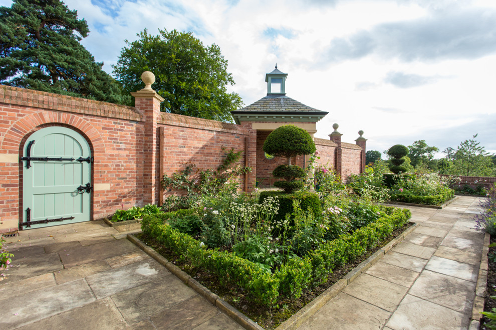 Photo of a traditional formal garden in Cheshire.